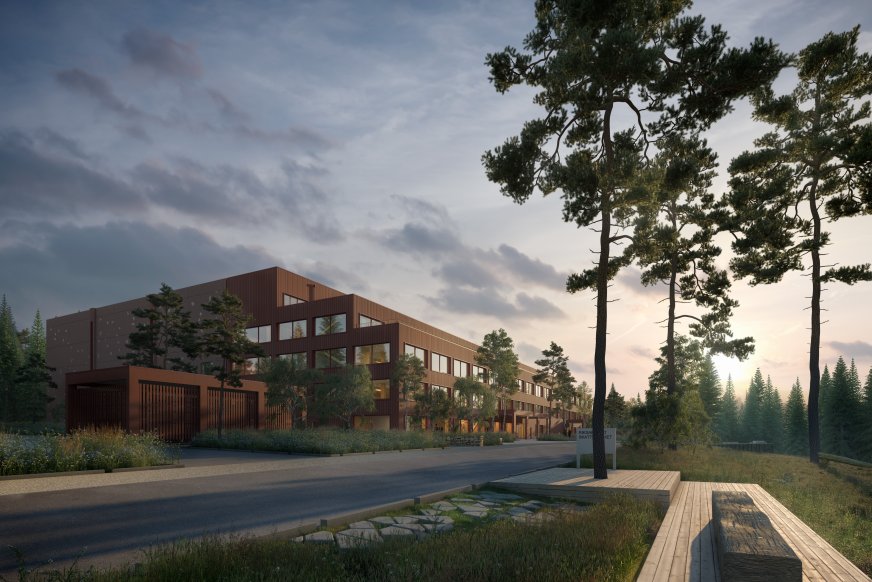 Byggnad omgärdad av natur.