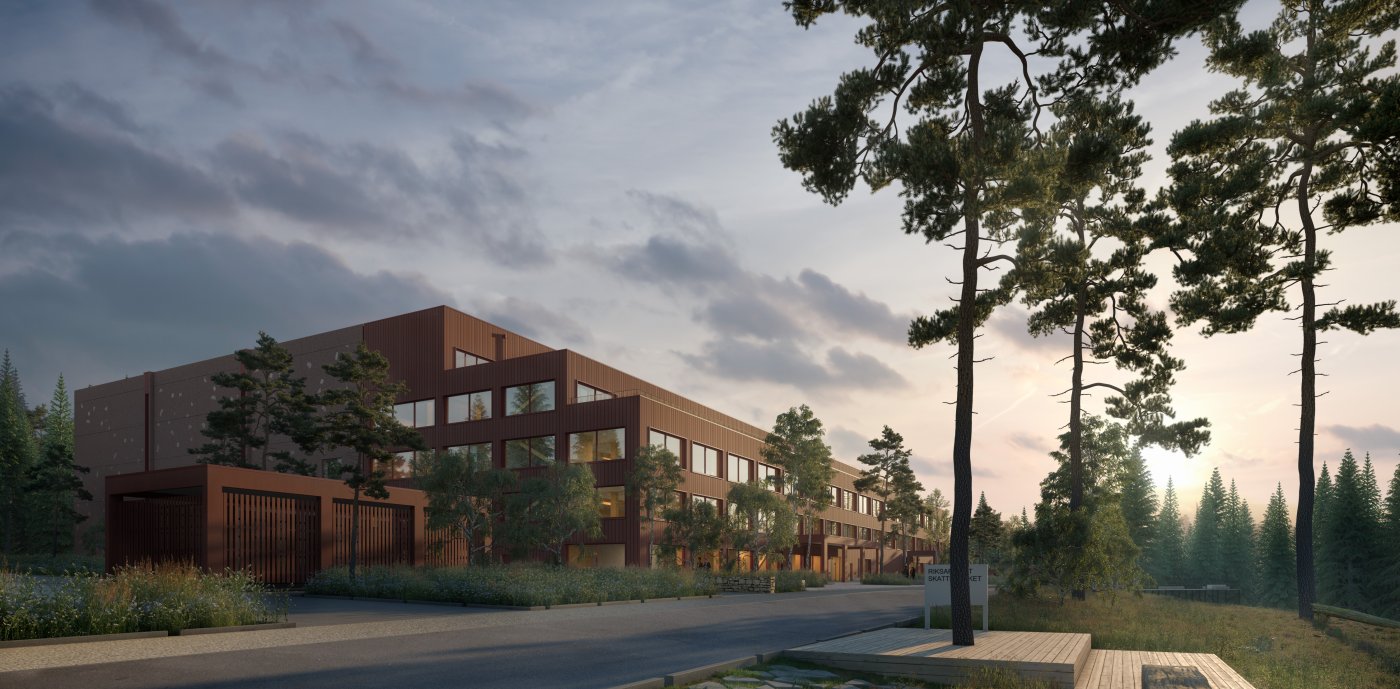 Byggnad omgärdad av natur.